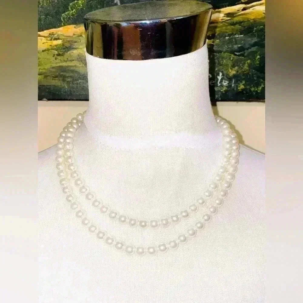 Faux pearls necklace. Long.  Stamped Claire’s
